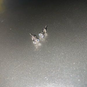 Sterling silver setting white sapphire studs